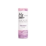 Pureday En cylindrisk Økologisk deodorant - Lovely Lavender 65g stick mærket "we love the planet," i en pastel lilla beholder med "dejlig lavendel" og en 65 grams indikator synlig, designet til optimal velvære.