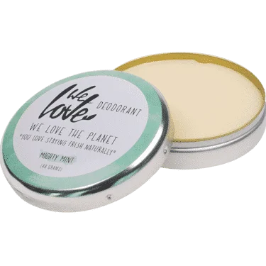 Pureday En åben dåse med Økologisk deodorantcreme - Mighty Mint, der afslører et solidt bleggult produkt fra Pureday.